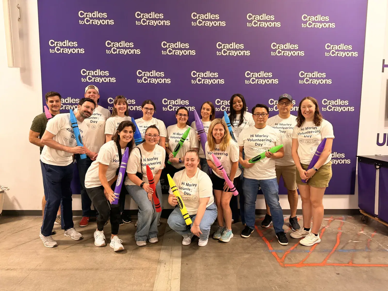 Hi Marley employees packing donations on a volunteering day.
